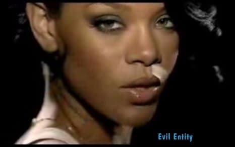 rihanna umbrella devil face. the Devil and Rihanna.