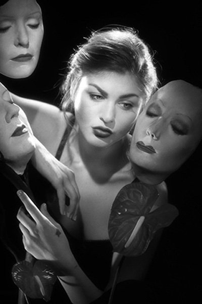 Frances Bean Cobain in a mind controlthemed image with masks representing 