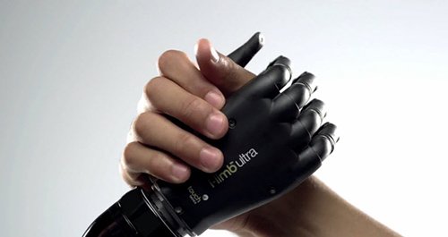 This artificial limb company probably paid a good chunk of change to have its product featured in the video. It is also there because it perfectly synchs with the robotic-dehumanized theme of the video.
