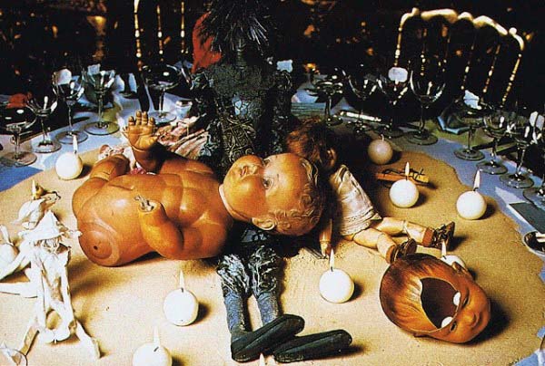 On the
diner table are dolls that are dismembered or with a shattered skull. This
imagery is also prevalent in countless music videos. Its all about the occult
elite's MK culture.