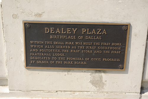 The plaque at the bottom mentions that Dealey Plaza is the site of Dallas' first "Fraternal Lodge" which is a Masonic Lodge.