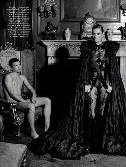The caped Kate Moss, representing the "Mother of Darkness" in Monarch programming, casts a dark shadow next to a helpless, naked slave.