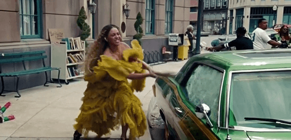 Beyoncé walks in the streets of New Orleans and starts breaking cars with a baseball bat. She's not only breaking the car of her cheating husband - she's breaking random cars.