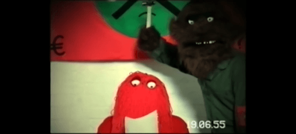 Red Guy forced to read a memo under threat of being hit on the head with a hammer by some monster. The date is still June 19th 1955.