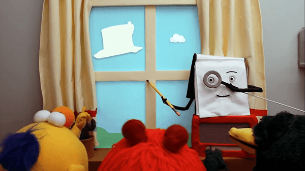 The notepad teaches the puppets how to watch clouds creatively.