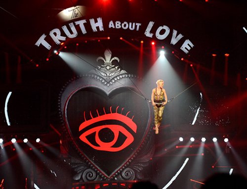 The set of Pink's show features a big, red prominent All-Seeing Eye. Why? Because. It has to be everywhere.