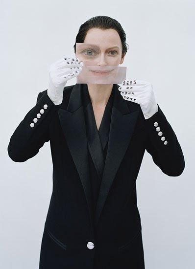 There Tilda goes all one-eyed Illuminati with it. The eye and mouth appear to be a of a different person, which may hint to the concept of programmed alter personality in Mind Control.