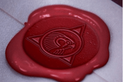 A wax seal also features that symbol.