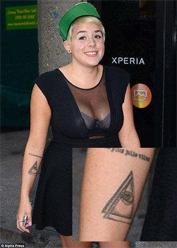 Here's Tom Cruise's daughter Isabella Cruise walking around with a tattoo featuring a familiar symbol: the triangle and all seeing eye. A ladder leads to the top of it. These Cruise children sure do love that symbol.