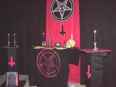 A Church of Satan altar. Are those crosses there in honor of St. Peter? No, they represent the inversion of Christianity.