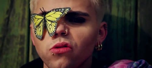 "The Voice UK" finalist Vince Kidd is trying to make it big in the industry. In his video "Zoo", he's got one eye hidden by a monarch butterfly (representing Monarch programming). 