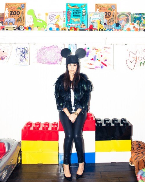 Now let's look at Yeezus' sister-in-law Chloe Kardashian and her photoshoot for The Coveteur magazine. This seemingly innoncent article on her "Louboutin-filled" closet is actually more filled with MK imagery. Here she is posing weirdly with the now non-avoidable Mickey Mouse hat, the symbol of mind control in the entertainment industry.