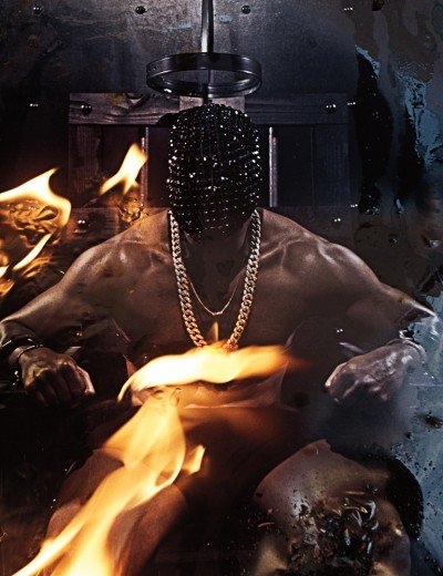 Speaking of Almighty Yeezus, here's Kanye West in a photoshoot for Interview magazine. It was shot by Steven Klein who directed Lady Gaga and Britney Spears videos. Unsuprisingly, there is mind control in the photoshoot. Here, Kanye is sitting in what appears to be an electric chair with an uncomfortable mask on his head.