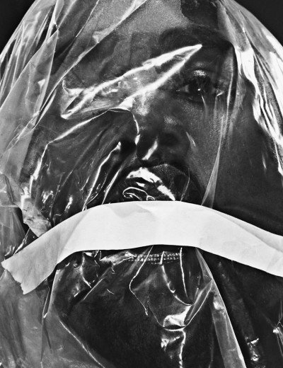 Here he appears to be suffocating, a common torture used on MK slaves. While this shoot may represent Kanye's "trials and tribulations" and whatnot, the imagery still reinforces the promotion of deshumanziation and torture in mainstream media.