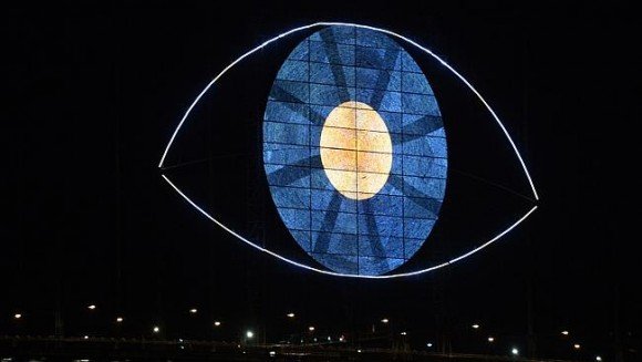 Here's what people in Sydney saw on New Years Eve: A giant All-Seeing Eye watching the city. Creeptacular.