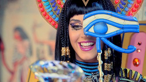 Katy-Patra's looks at the diamond through a big Eye of Horus thing, which actually hides her eye. This is symbolic for a few reasons: First, it tells the viewers that Katy-Patra plays the role of the occult elite in the video. Second, she CANNOT see through the Eye (it is opaque) she is half-blinded by the elite's greed for power and material possessions. Finally, children who watch music videos need to be exposed to that one-eye sign all the time.