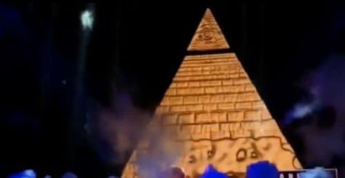 Here's a pic taken from Miley's "Bangerz Tour". Yes, it's an Illuminati pyramid, complete with All-Seeing eye rising out of nowhere while young girls cheer frantically. That is today's pop culture.