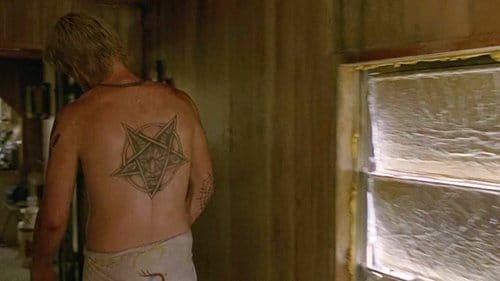 Reggie Ledoux, one of the culprits carrying out rituals has a tattoo of Baphomet inside an inverted pentagram on his back, the sigil of the Church of Satan.