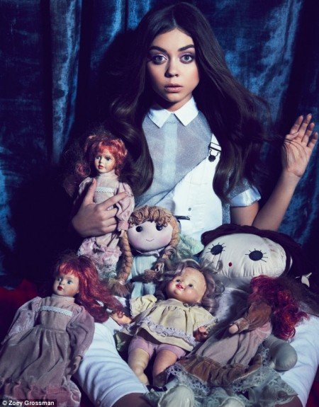 Sarah Hyland did a photoshoot for Flaunt magazine. It's all about her looking dissociated, surrounded with dolls representing alter personas. 
