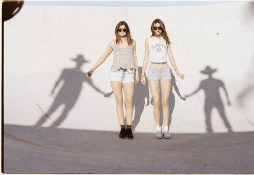 Although displaying no discernable talent applicable to the entertainment industry, Kendally and Kylie Jenner are being pushed into the spotlight. Why? This pic pretty much explains it all. They're holding the hand of invisible shadow men. Who do you think these shadow men refer to?