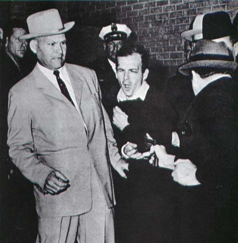 The legendary picture of Lee Harvey Oswald being shot by Jack Ruby. The event was televised live to millions of viewers.