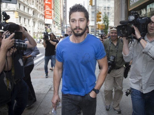 Actor Shia LaBeouf walks through the media after leaving Midtown Community Court following his arrest the previous day for yelling obscenities at a Broadway performance of "Cabaret", Friday, June 27, 2014, in New York. 