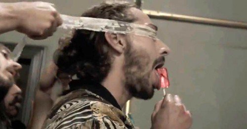 In the video, Shia is given a lollipop with a little scorpion inside - alluding that it is most likely a poisonous, mind altering drug. 