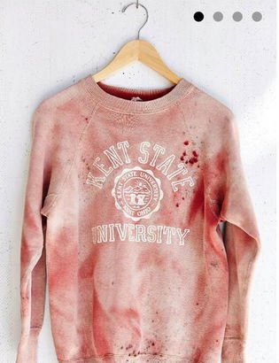 This Urban Outfitters shirt is designed to be stained with blood, which is already slightly disturbing. What makes matters worse is that it is a "Vintage Kent State Sweatshirt". In 1970, Kent State University was the site of bloody shooting where four unarmed anti-war students were shot and killed by the National Guard of Ohio. What a sick was to commemorate an awful event. But what do you expect from the fashion world?
