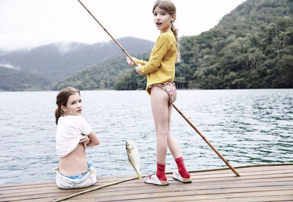 Another reason I hate the fashion world : The blatant and repeated sexualization of children. This photoshoot in Vogue Children Brazil features young girls in all kinds of suggestive positions and situations. Here's a pic of a girl undressing while catching some creep pervert taking a picture of them.