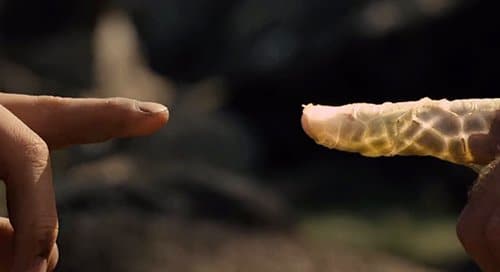 Noah then goes to touch the finger of his father, which is all illuminated by the snake skin. This magical scene represents the passing down of the magical bloodline from one generation to another.