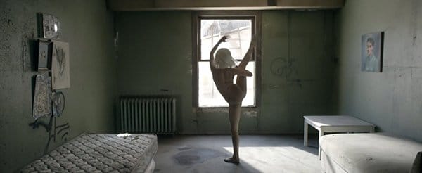Sia dances around a dirty room with a disgusting mattress (wear she must probably sleep on). Above that mattress are weird drawings, the type of drawings an MK slave would draw, including a face with four eyes - which represents a split personality.
