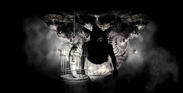 As Muse sings about the Handler, a bunch of symbols appear around him. A moon crescent inside a cage represent the sleepiness and the imprisonment of the MK slave.