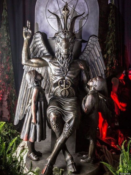 The caduceus on Baphomet's lap is meant to represent an erect phallus. Combined with the two children, this statue is a true nod to the occult elite's favorite obsessions.