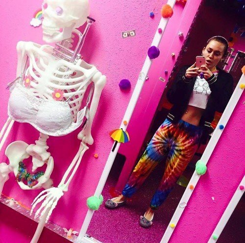 Another industry slave is, of course, Miley Cyrus, who constantly posts MK-Ultra-themed pictures on Instagram. In this pic, we see a skeleton wearing a bra with a butterfly in the general area where the genitals would be. A great way to portray Beta Kitten slaves.