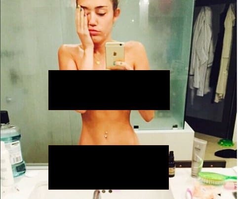Before the VMAs even started, Miley posted a pic on Instagram about hosting the VMAs - totally naked and strategically hiding one eye. A great way of telling us that she'll be the ultimate Beta Kitten slave.