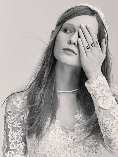 This pic is from the Elie Saab Bridal collection. In this image, the model is saying "Oui" (yes) with the one-eye sign. Is she getting married to someone ... or the occult elite?