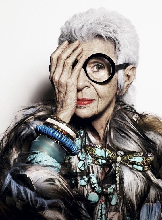 Iris Apfel is a "American businesswoman, interior designer, and fashion icon" ... who works for the occult elite.
