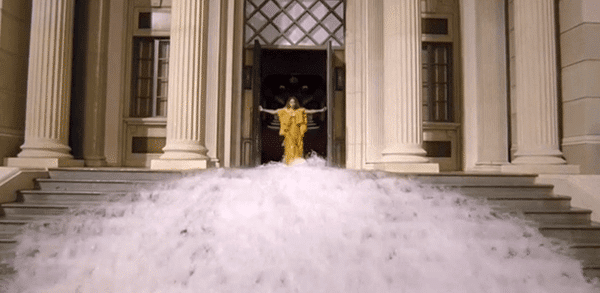 Beyoncé emerges from a temple surrounded with water the same way a baby emerges from the womb after the water breaks.