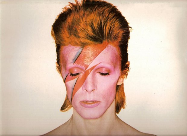 Ziggy Stardust's with his iconic lightning bolt drawn across his face.