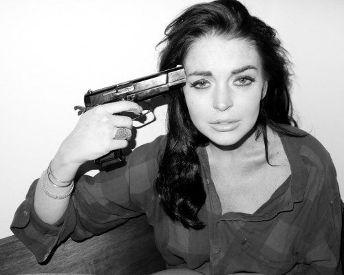 In another shoot with Terry Richardson, Lohan appears geniunly traumatized.